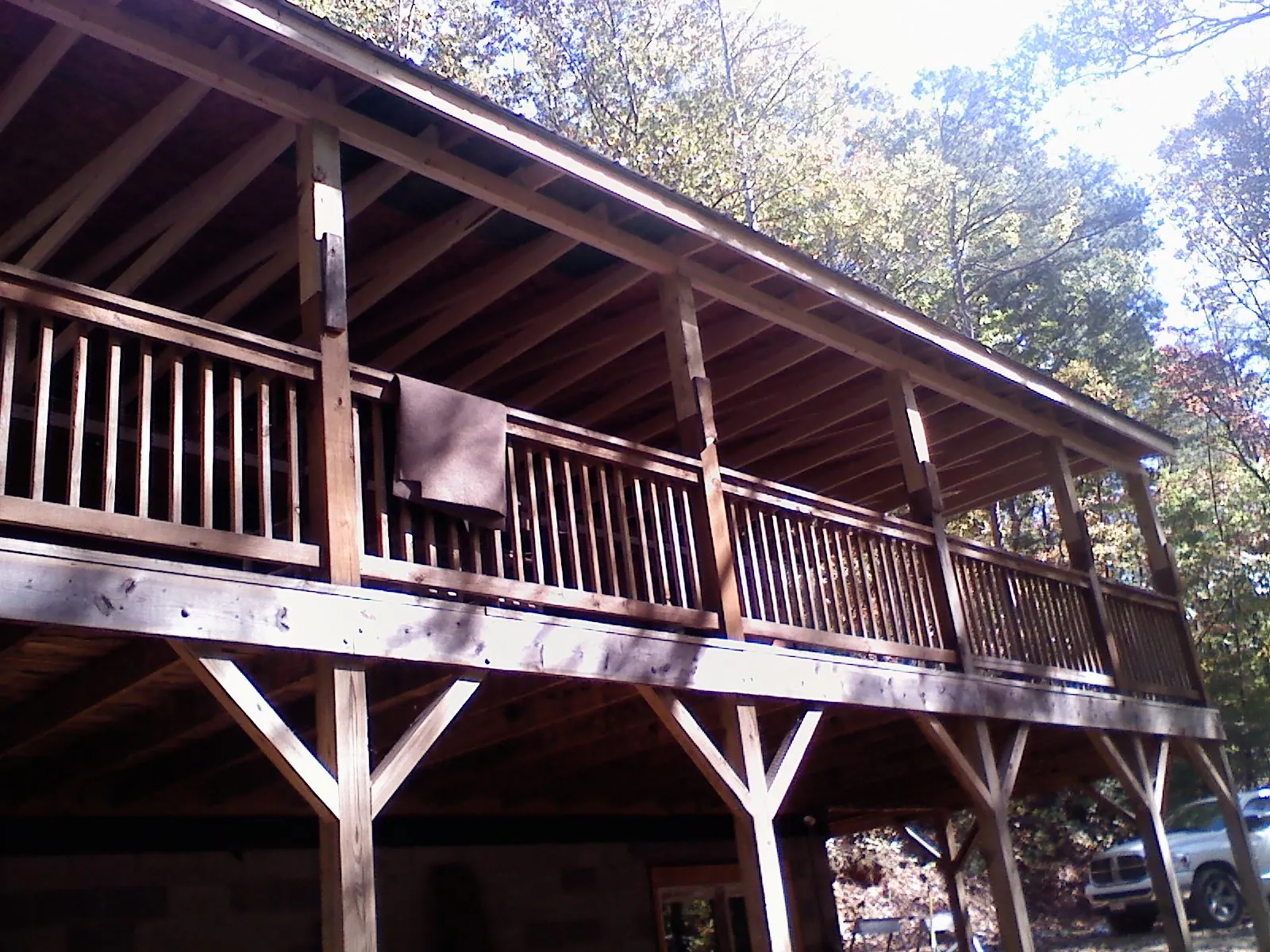 Timber framing under a new elevated porch and deck — Roof Leak Repair in Dateland by Roofing Brothers